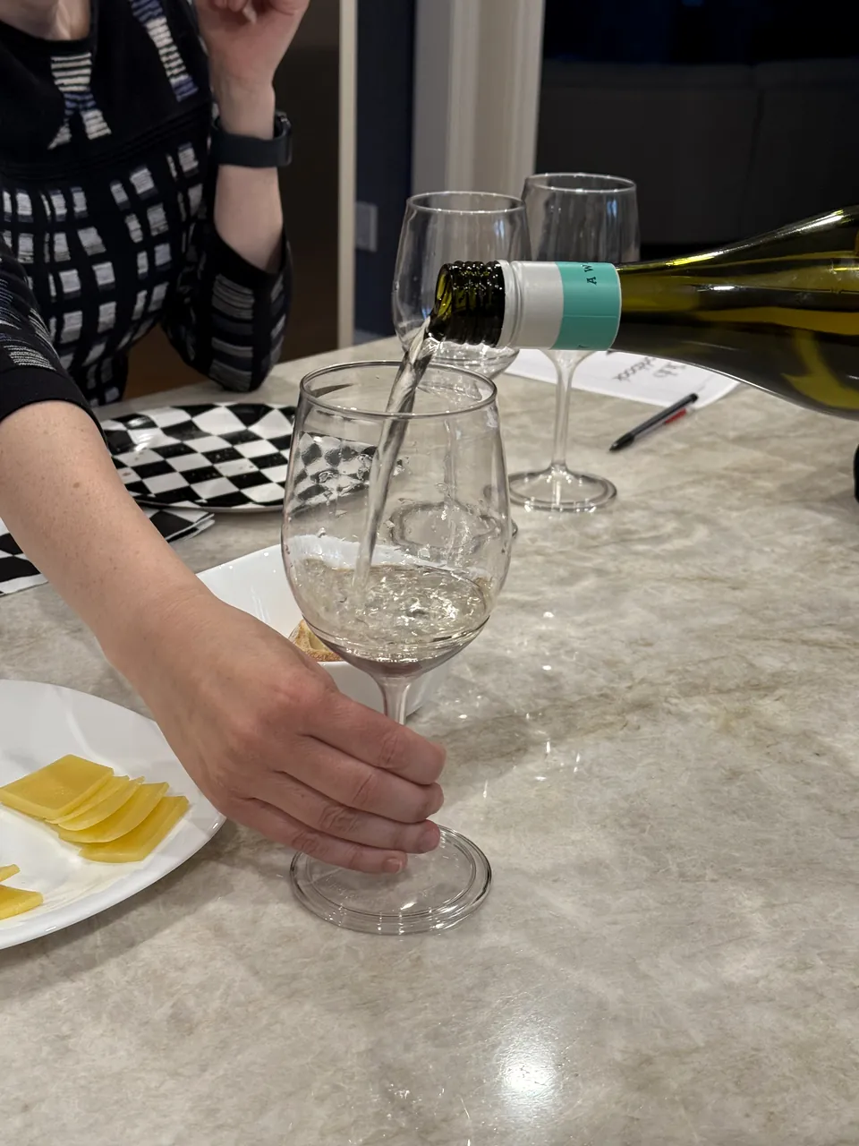 Wine being poured into a glass